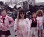 girls with baseball bats wearing pink slamming cancer